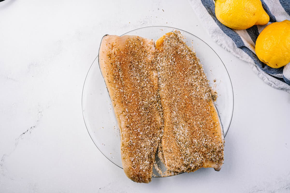 Generously season trout with spice mixture.