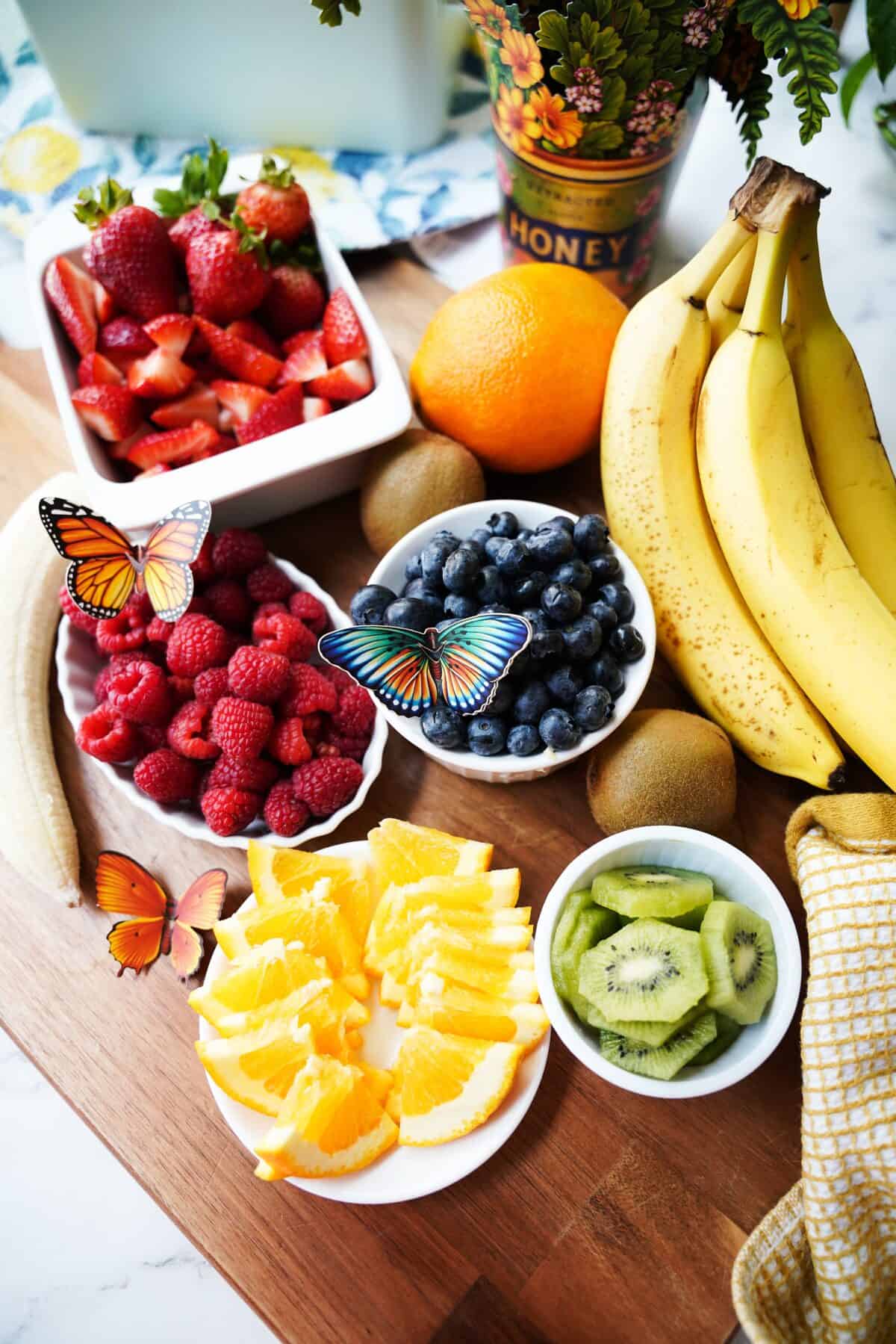 ingredients for creating a butterfly fruit platter