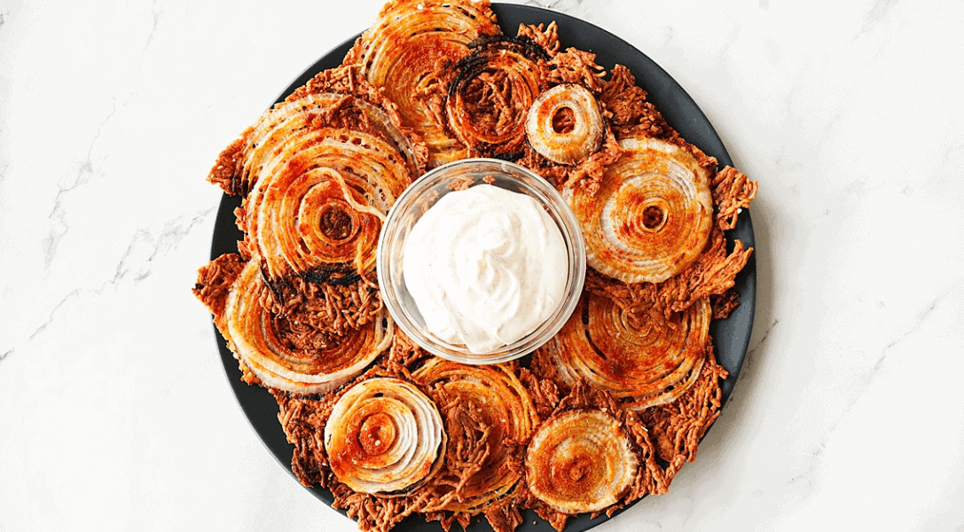 Crispy Onion Chips on platter with dip