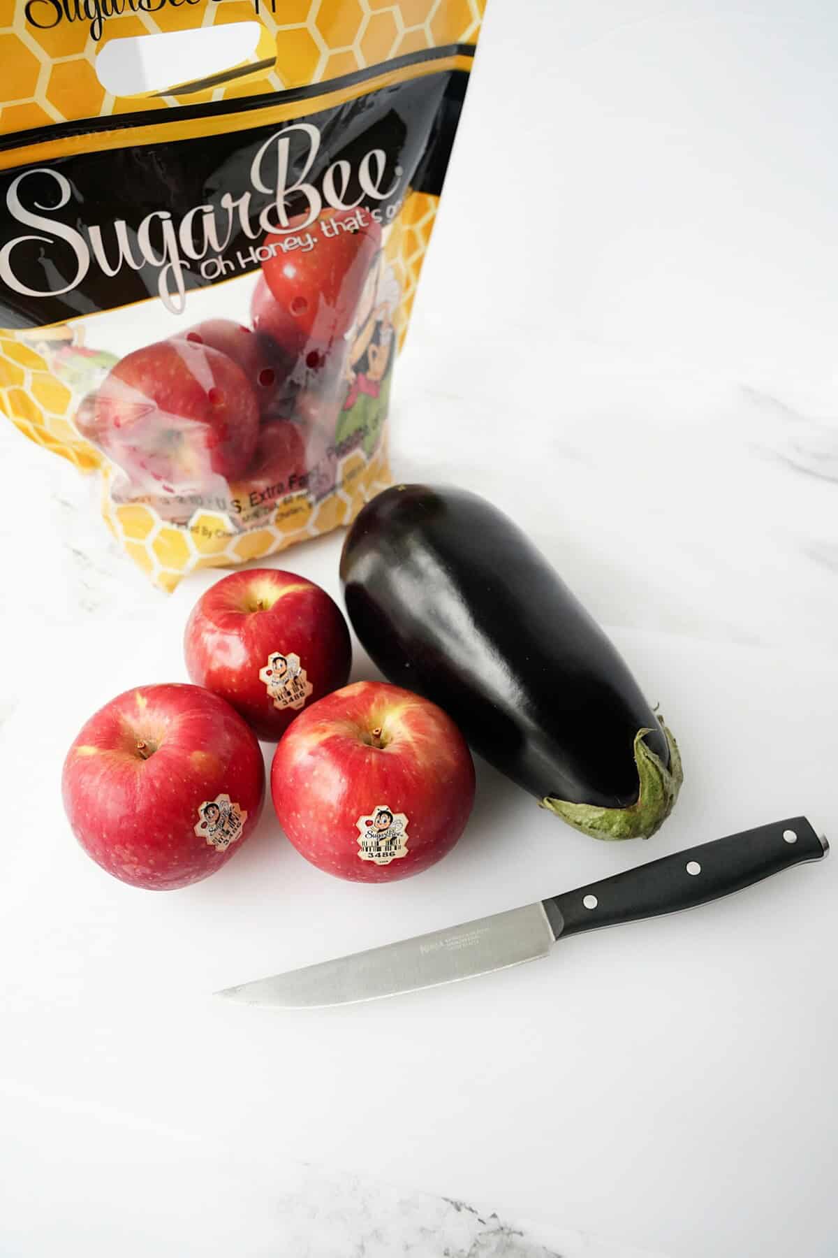 SugarBee apples and an eggplant