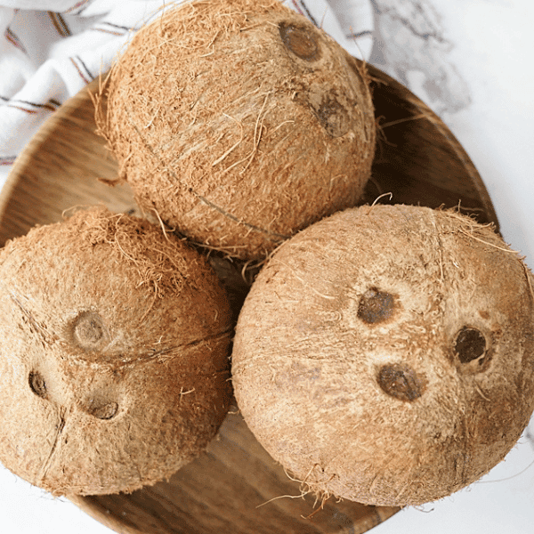 3 coconuts in a bowl