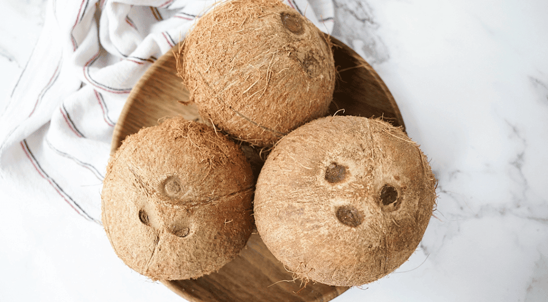 3 coconuts in a bowl