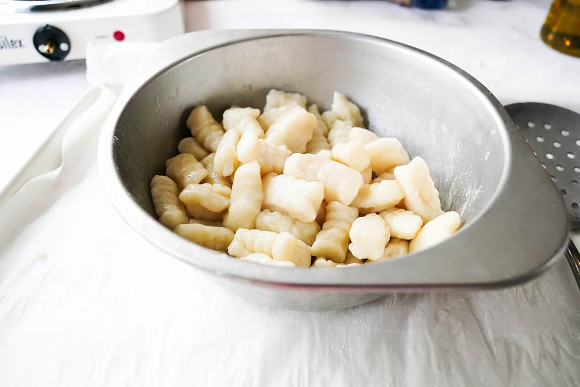 potato gnocchi in stainless steel bowl