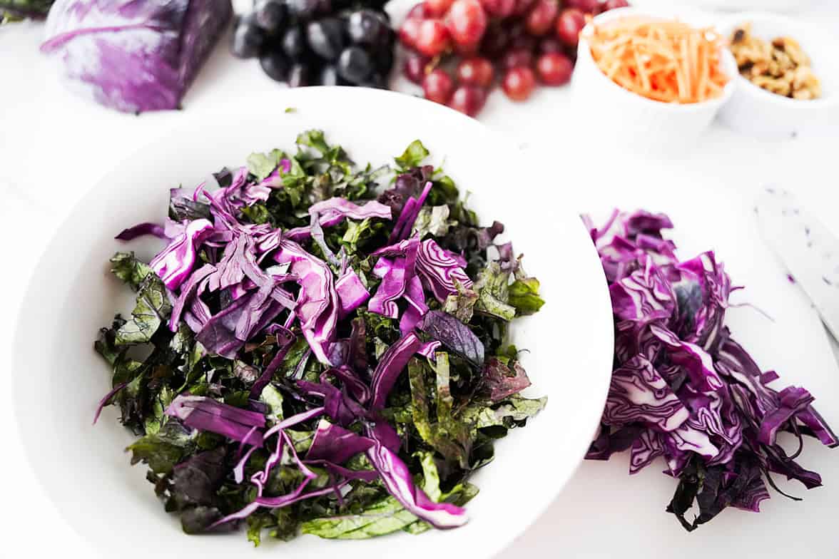 greens in a white salad bowl