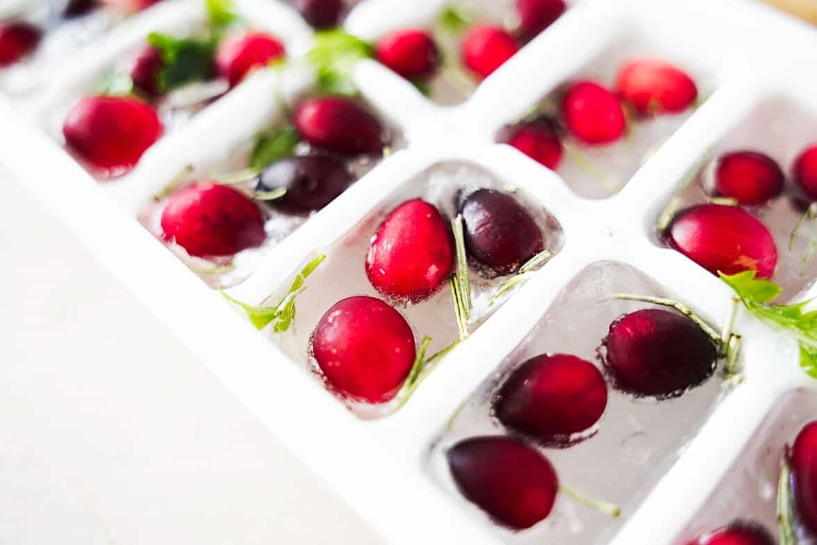 Close up of cranberry ice cubes in the tray