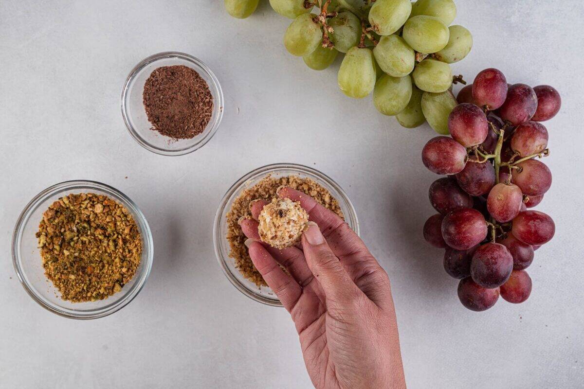 A goat cheese-covered grape rolled in nuts.