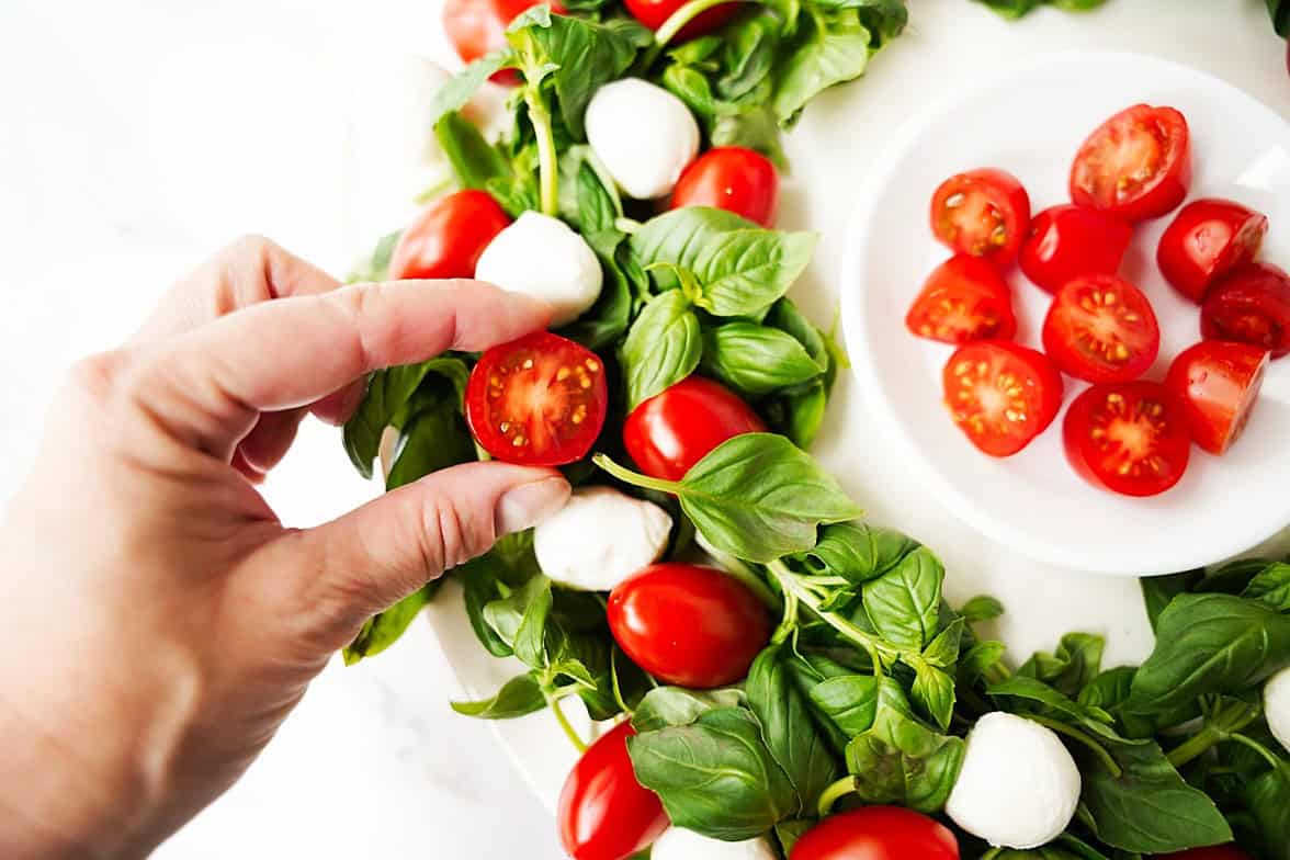 Add the halved tomatoes.