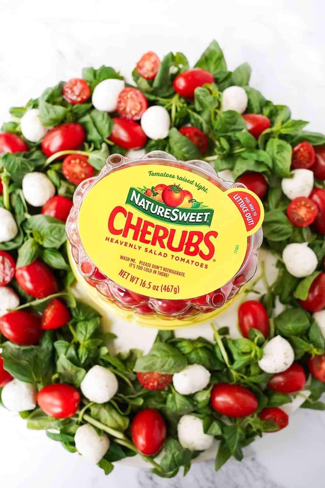 Caprese wreath with Cherubs® in the center.