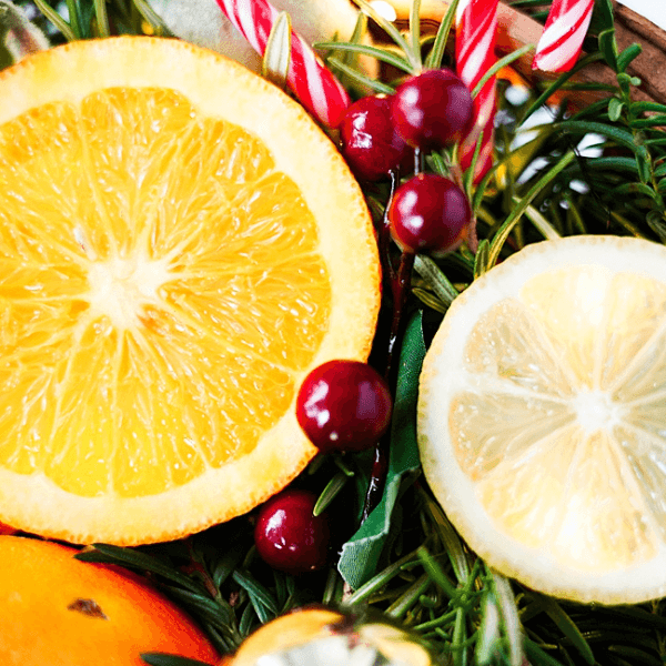 Up close view of citrus in a holiday basket