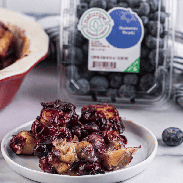 Plate of blueberry cinnamon rolls cassrole