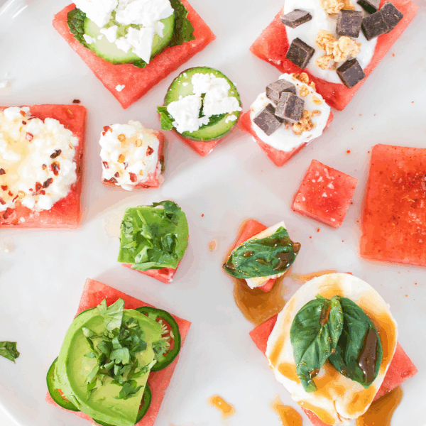 White plate holding watermelon flight with 6 flavor options