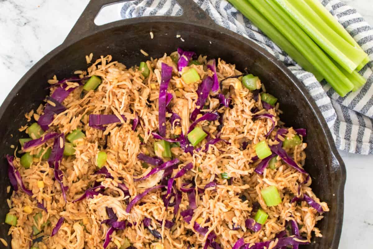 overhead shot of egg roll in a bowl recipe made in a cast iron skillet