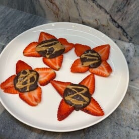 White plate with strawberry banana bark
