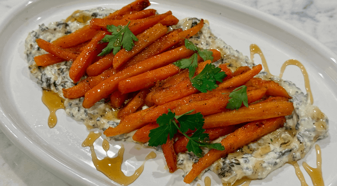 Crispy Carrot Fries on Whipped Feta with White plate