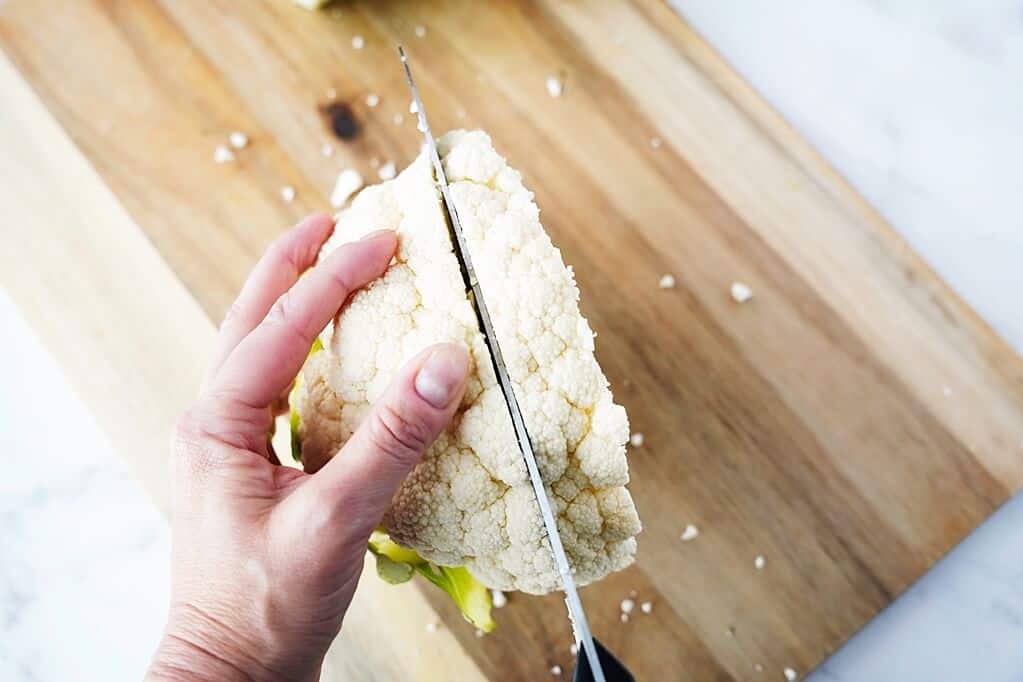 1 inch cut on cauliflower after cut in half to create a cauliflower steak