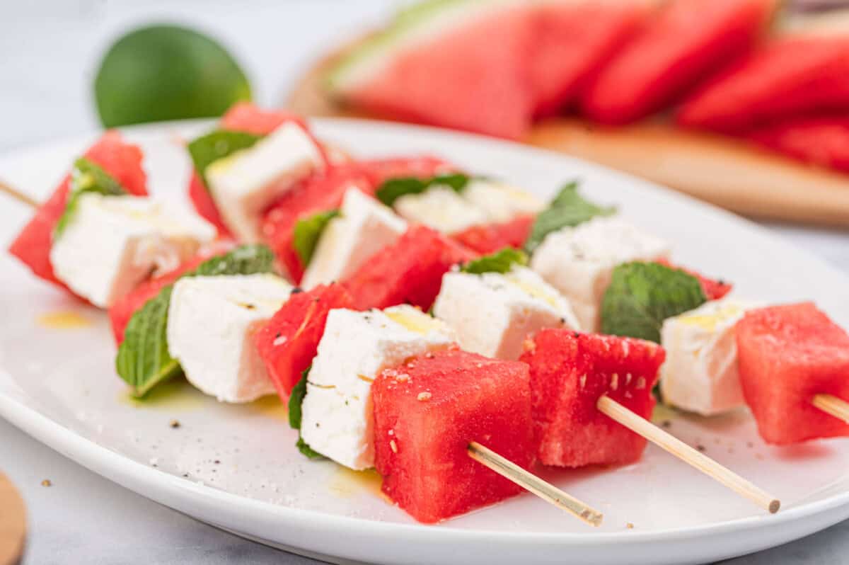 White plate with 3 Miediterranean Watermelon Skewers
