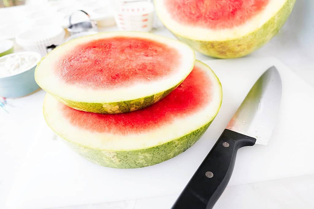 Sliced watermelon with a knife