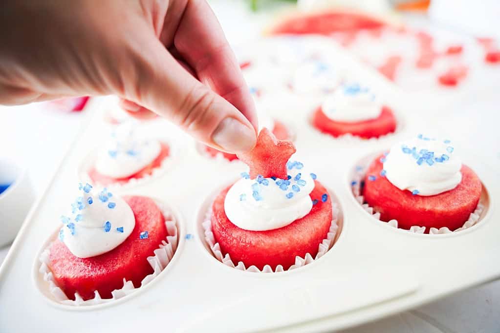 watermelon cupcakes with whipped cream, watermelon stars and bleu sprinkles