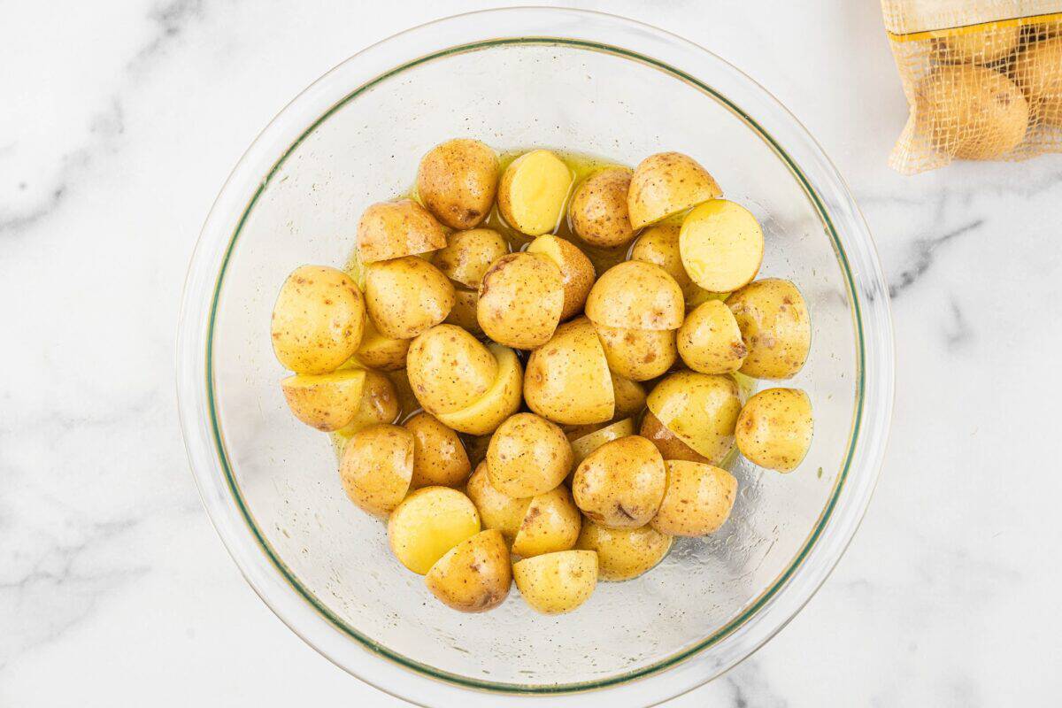 1-inch potatoes in a mixing bowl