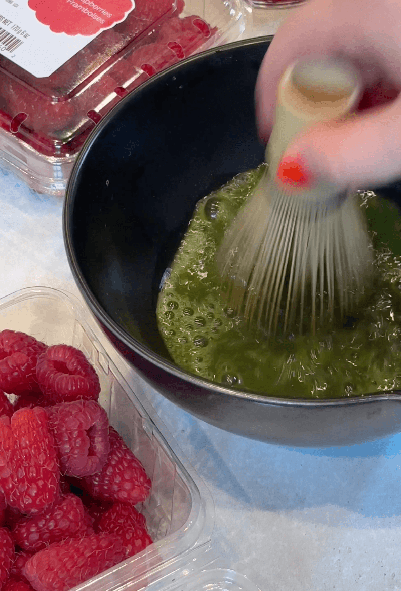 Mixing matcha in bowl