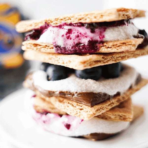 Stack of Blueberry S'mores showing 2 ways: fresh blueberries & blueberry sauce