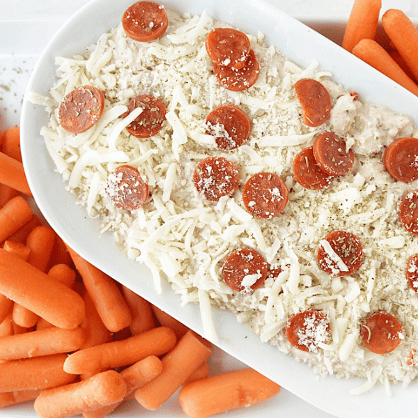 Overhead shot of the Ranch Pizza Dip on platter with carrots