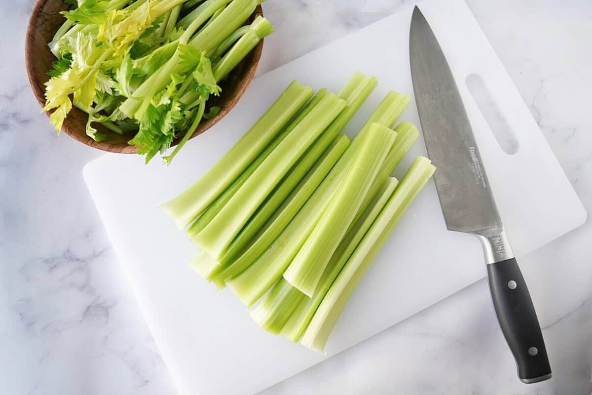 Celery sticks on a cutting board