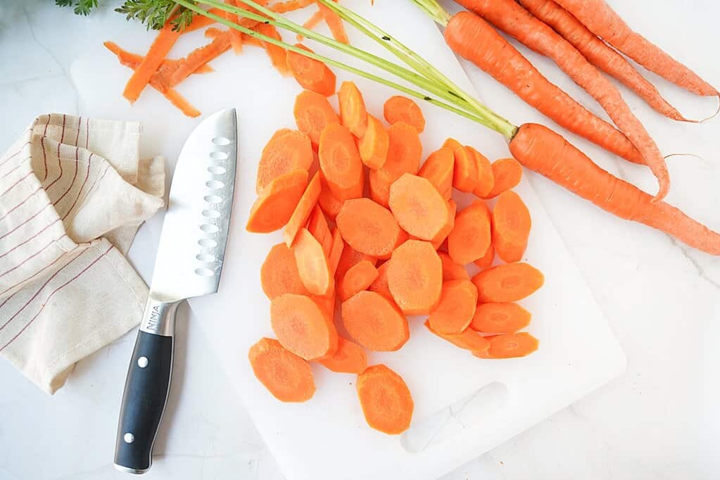 Cut rounds of carrots on a cutting board