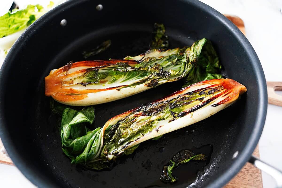 Pan roasting bok choy in skillet