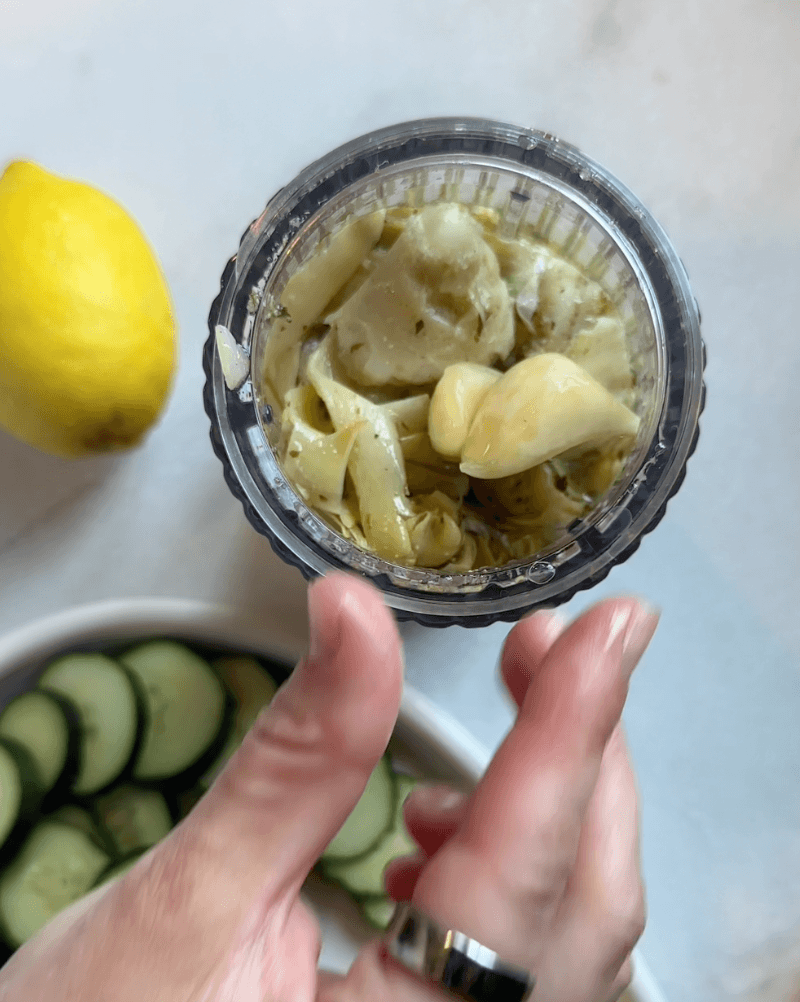 Adding ingredients into the immersion blender