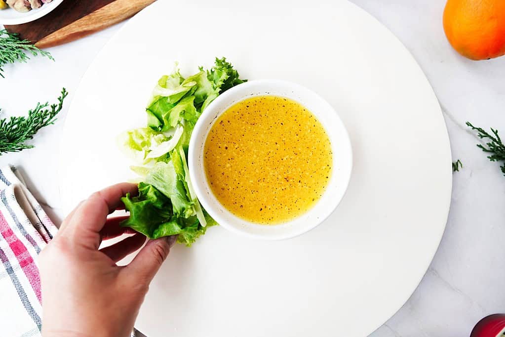 Add the spring mix around the edge of the plate.