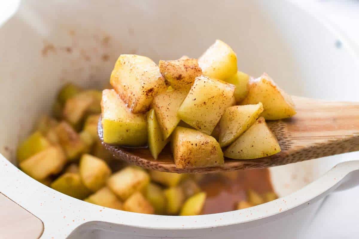 a spoonful of baked cinnamon apple cubes