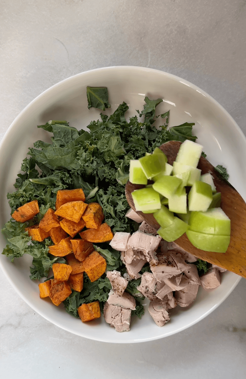 Assembling the Sweetgreen Harvest Salad
