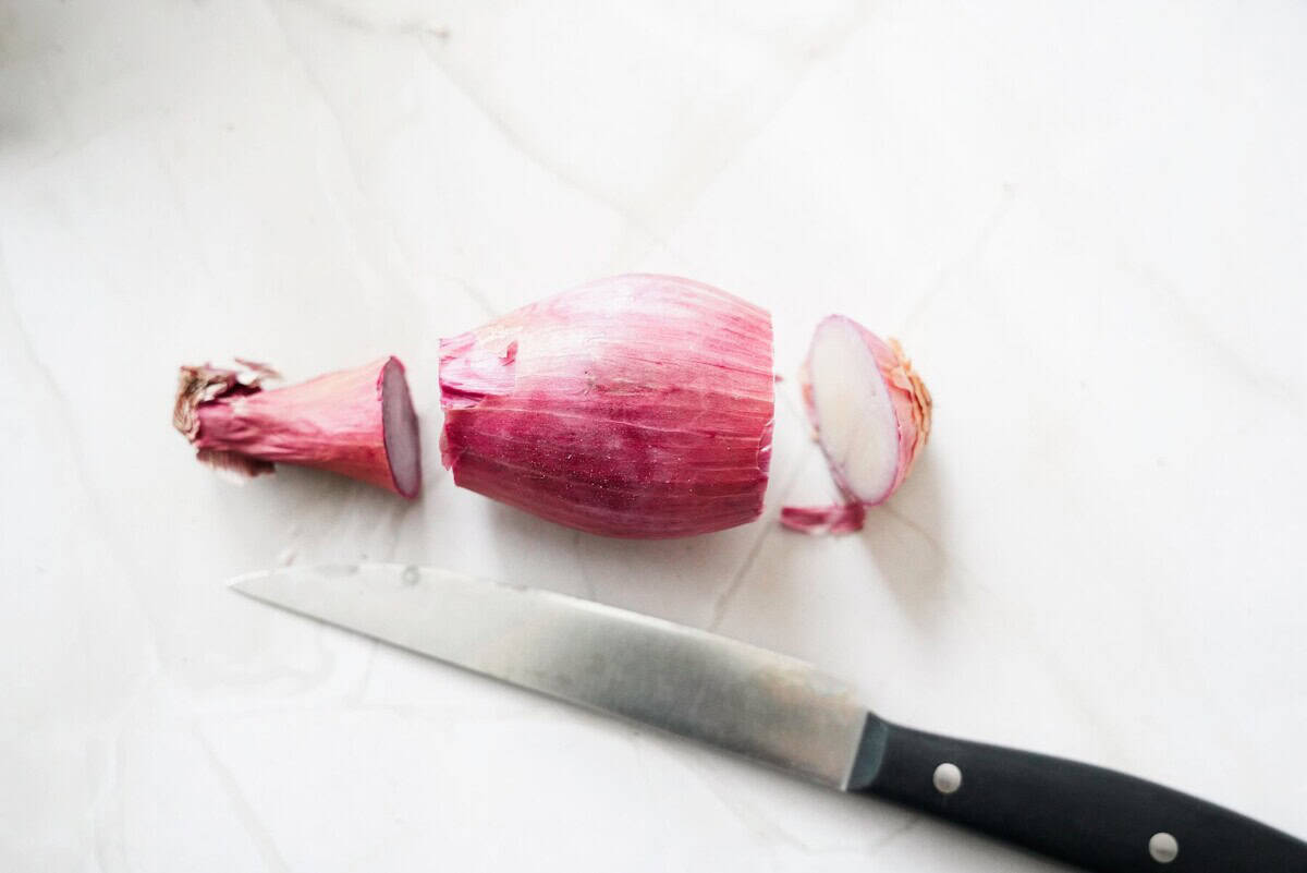 Cutting off both ends of a shallot