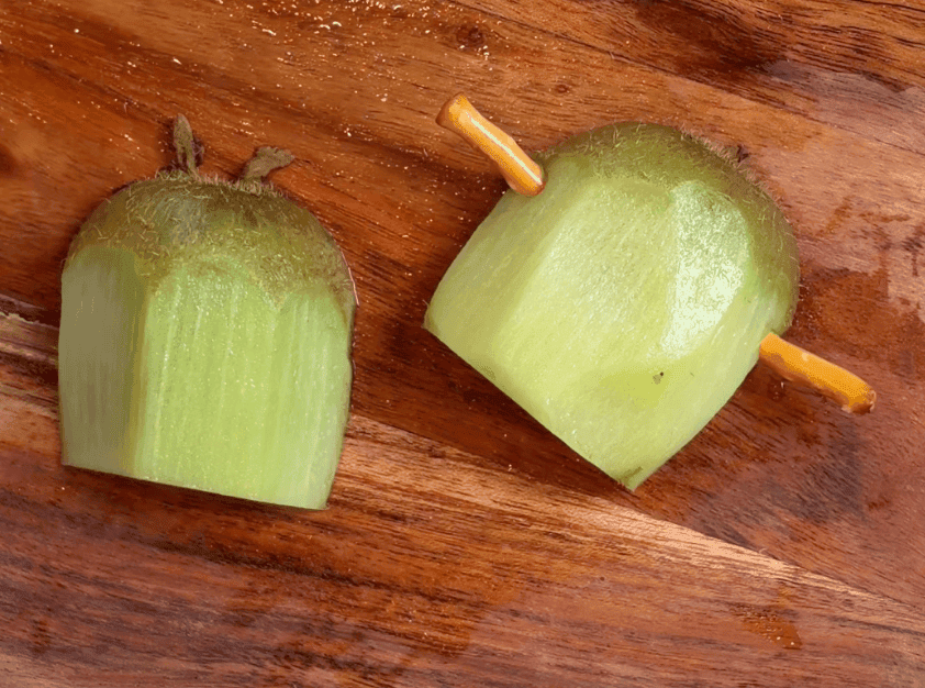 Kiwis with pretzel sticks going in