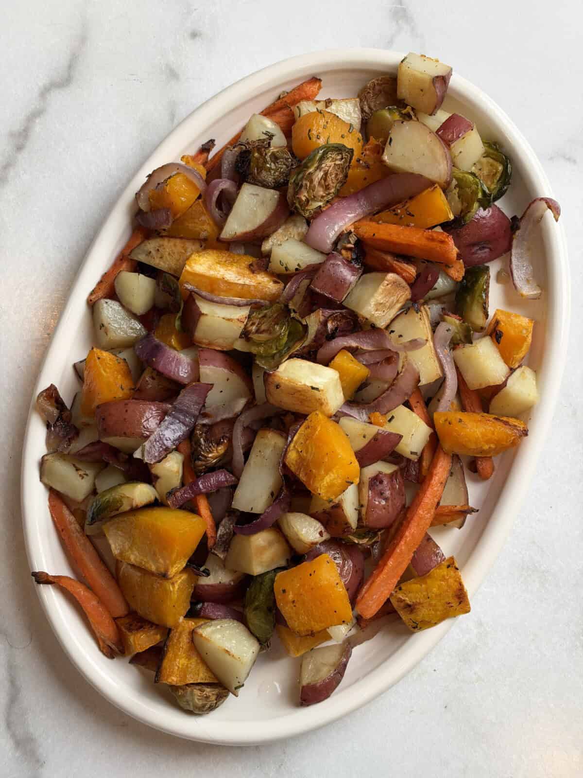 Vertical Image of Roasted Fall Veggies on white plate