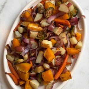 Vertical Image of Roasted Fall Veggies on white plate