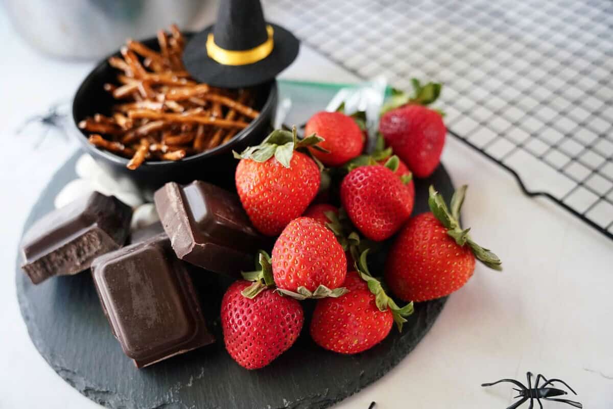 Ingredients for strawberry witch brooms on plate