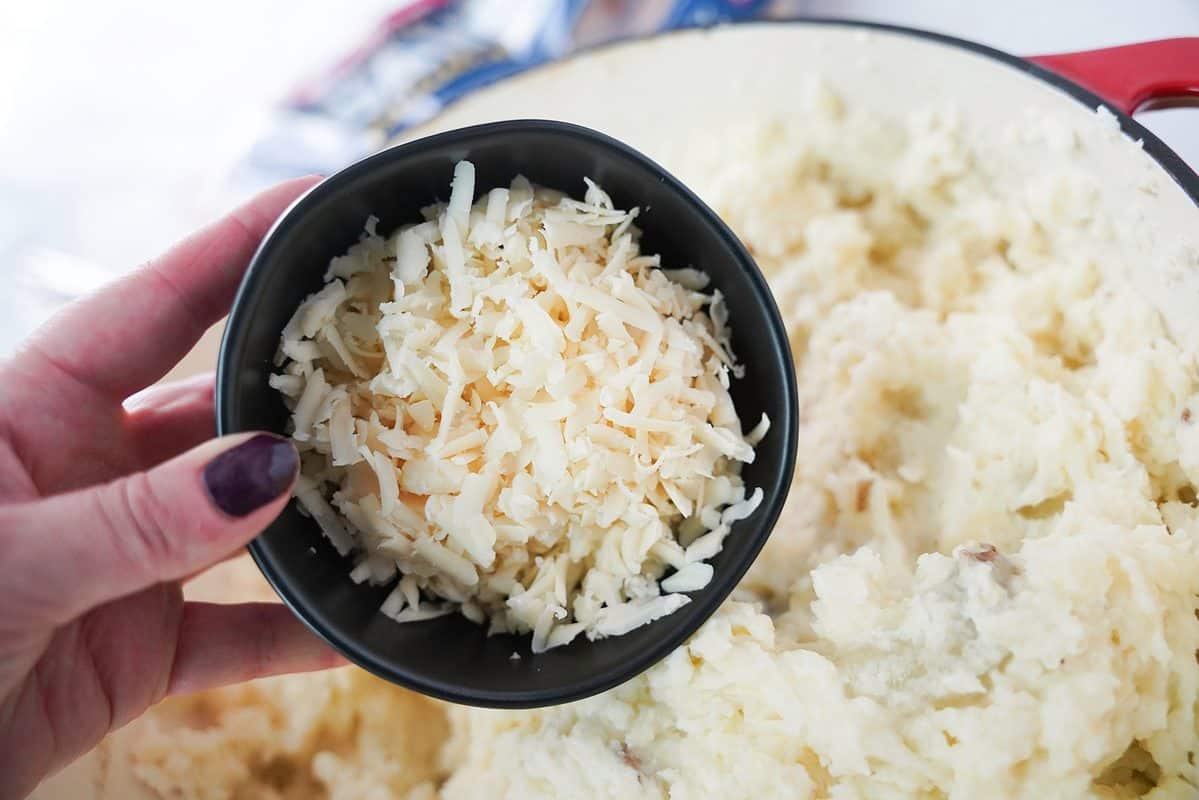 Fresh shredded Gruyère cheese mixed with mashed potatoes.